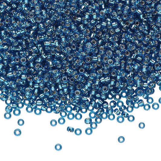 Miyuki Round Seed Bead 11/0 Transparent Silver-Lined Capri Blue (25)